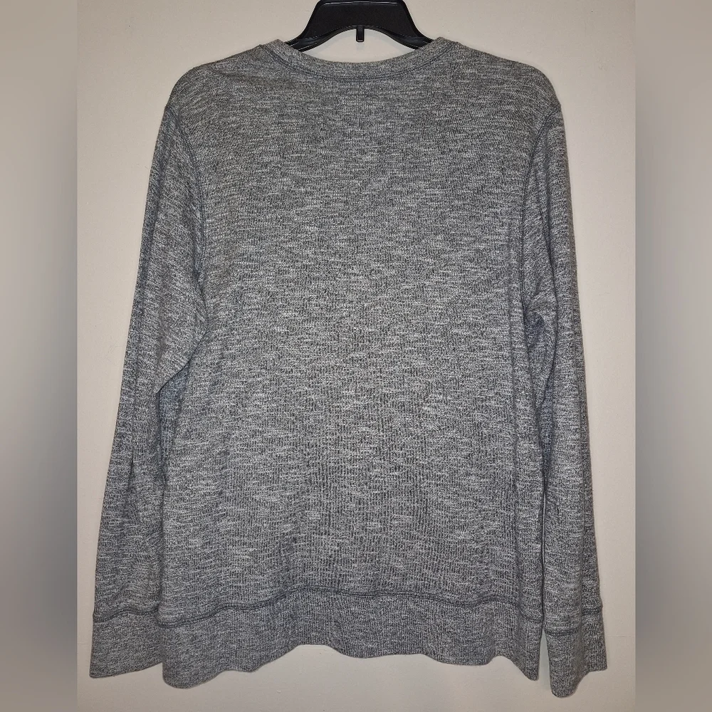 A The North Face men's cotton sweatshirt in a size large. Pre-loved